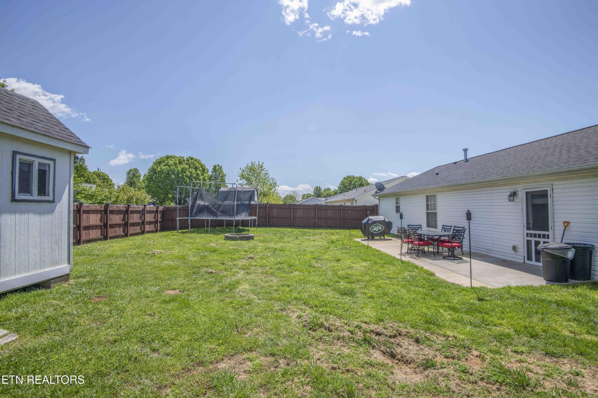 7533 Gary White Road Corryton, TN 37721 - Photo 42 of 44 a swimming pool with outdoor seating and yard