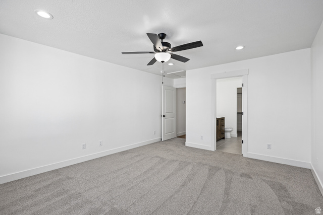 1139 South 4475 West West Point, UT 84015 - Photo 17 of 33 Unfurnished bedroom featuring light colored carpet, recessed lighting, a ceiling fan, and ensuite bathroom