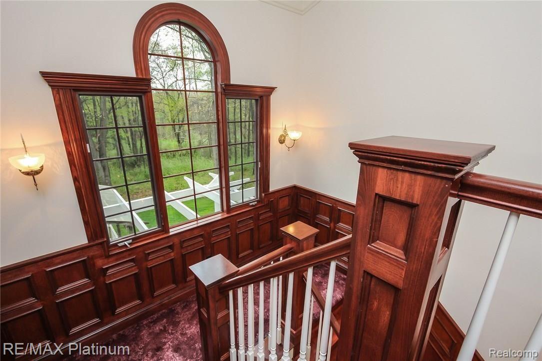 6945 Gawley Road Pinckney, MI 48169 - Photo 55 of 76 Let's head back downstairs~ notice the striking view. It's glorious in the fall!