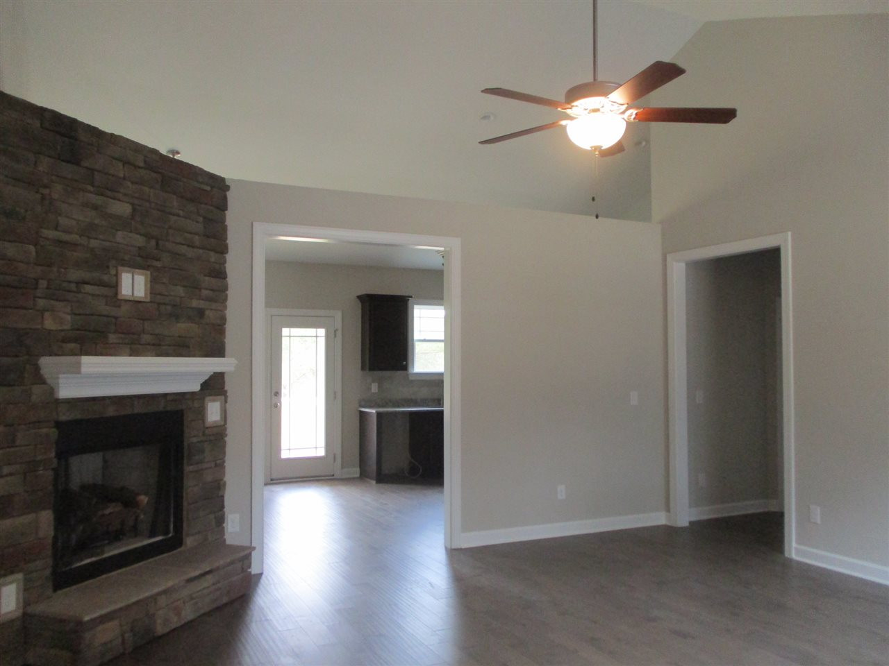Large Family Room with Vaulted Ceiling, Gas Log Fireplace and Much More! Family Room