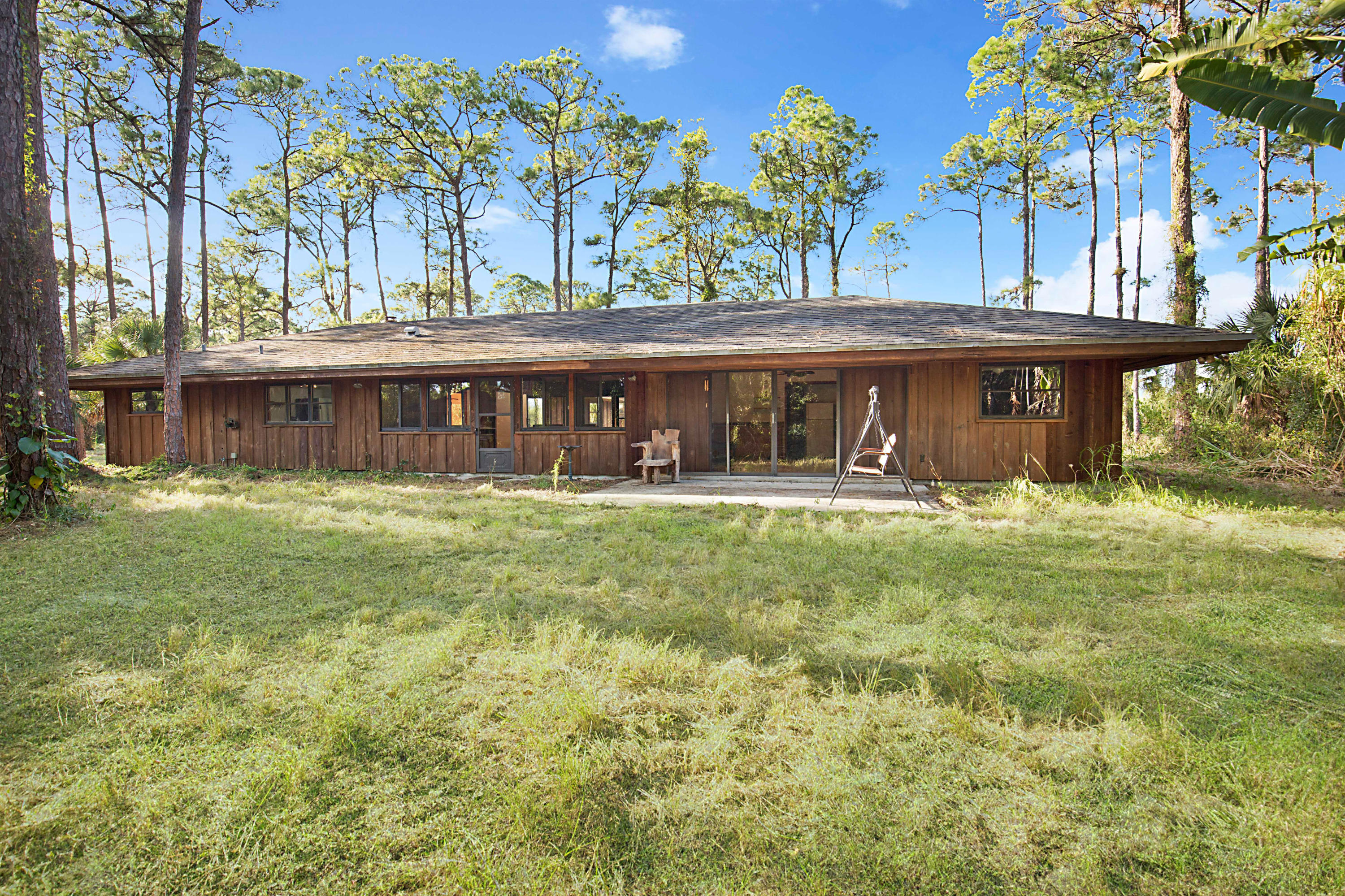 2340 A Road Loxahatchee Groves, FL 33470 - Photo 1 of 20 4/4 HOME ON 10 ACRES