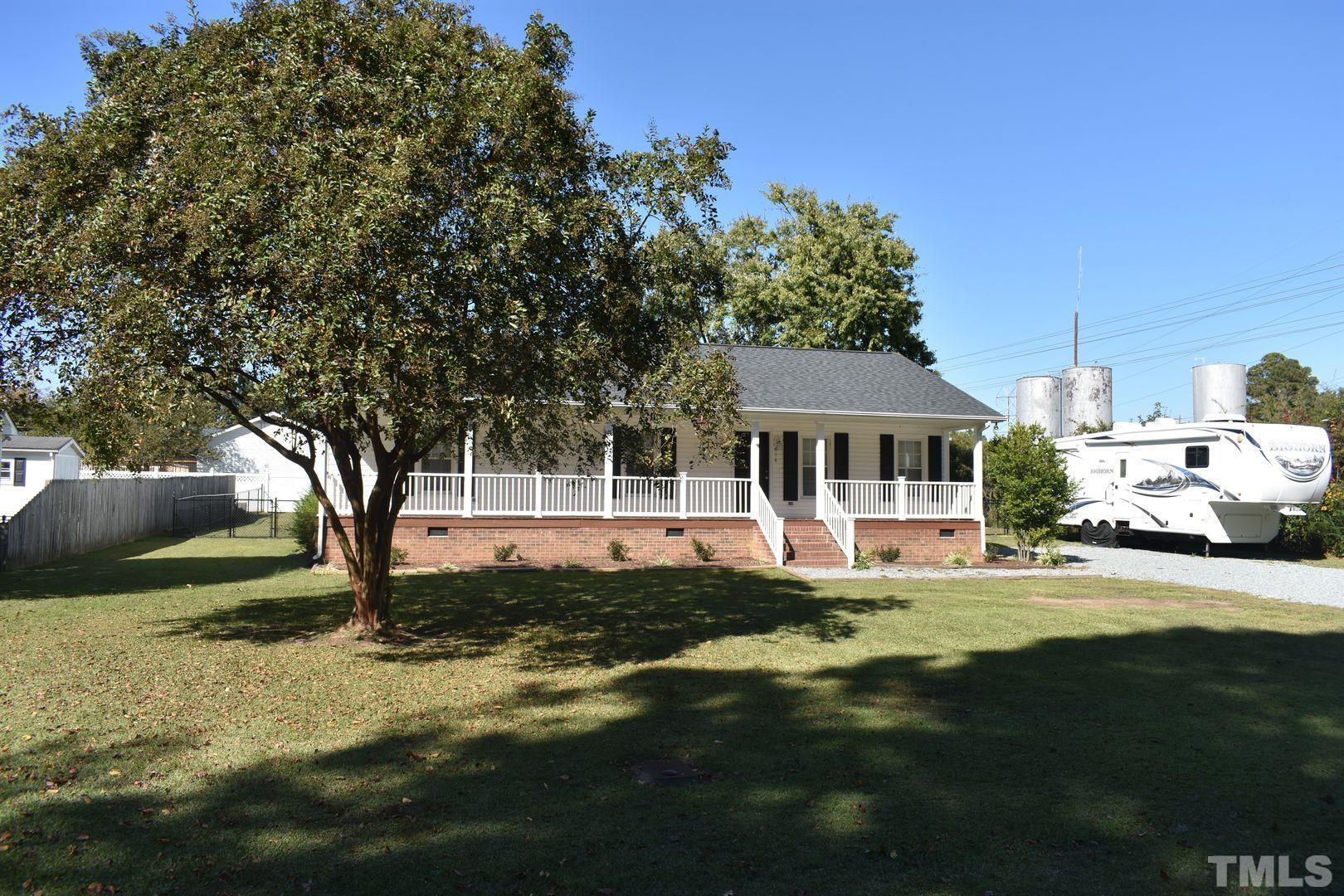 614 Mc Kay Street Erwin, NC 28339 - Photo 2 of 24 a front view of a house with a yard