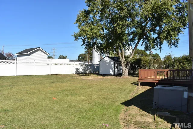 a view of a lake with a yard