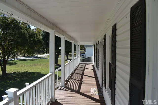 a view of swimming pool from a balcony