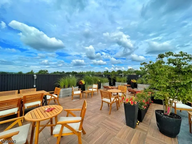 a view of a terrace with furniture