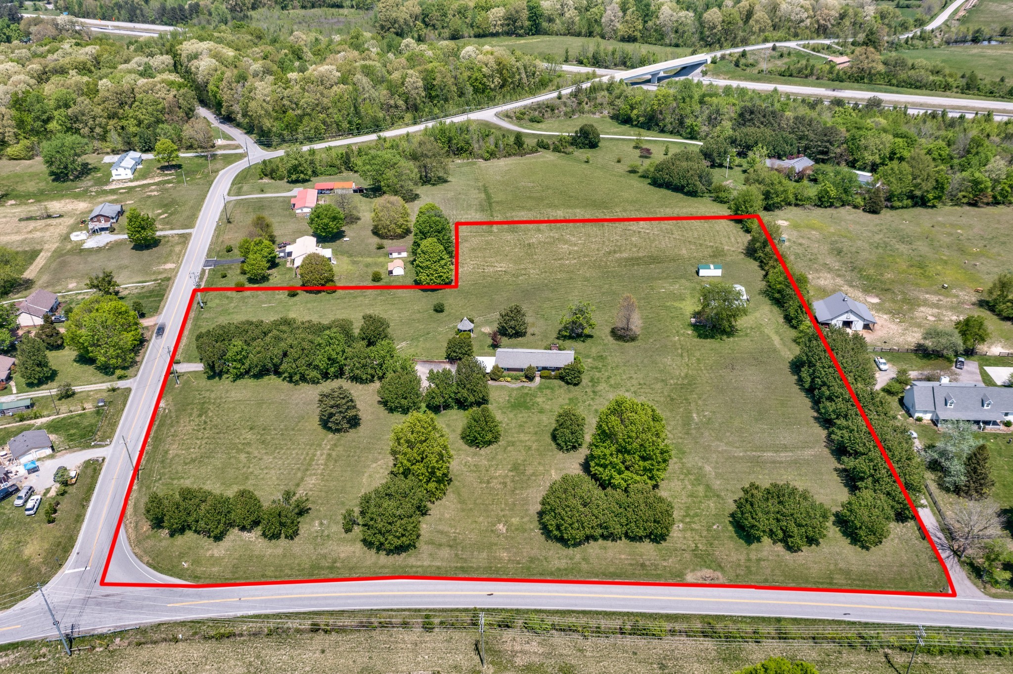 7486 Deer Ridge Road Primm Springs, TN 38476 - Photo 1 of 69 an aerial view of a house