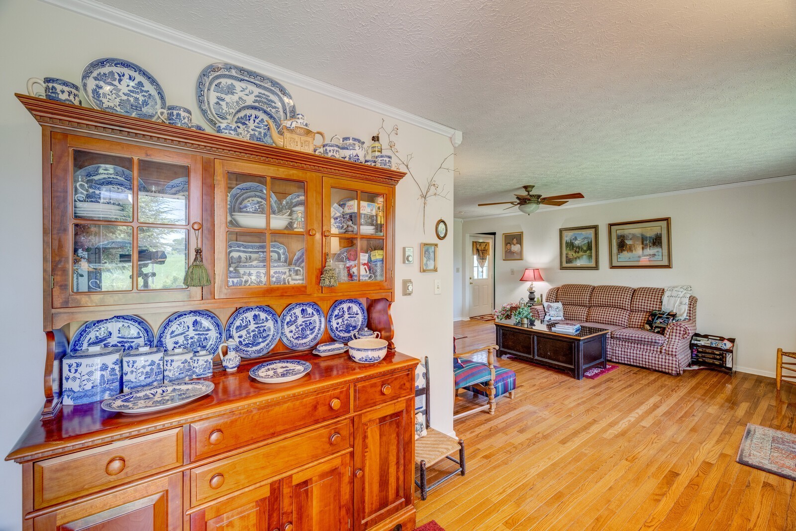 7486 Deer Ridge Road Primm Springs, TN 38476 - Photo 11 of 69 a living room with furniture and flat screen tv