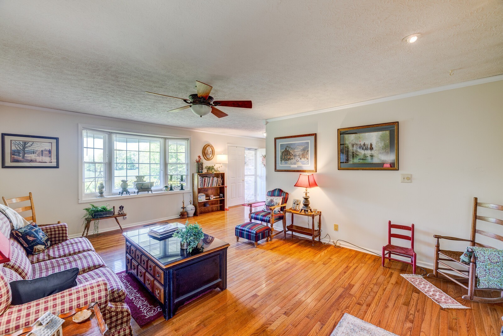 7486 Deer Ridge Road Primm Springs, TN 38476 - Photo 15 of 69 a living room with furniture and a wooden floor