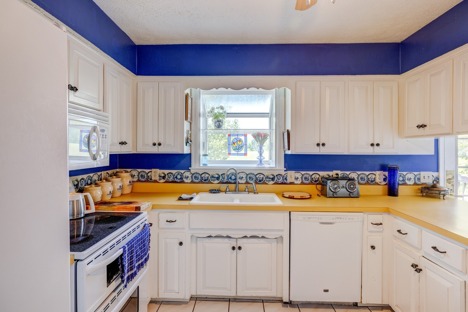 7486 Deer Ridge Road Primm Springs, TN 38476 - Photo 23 of 69 a kitchen with a sink and cabinets