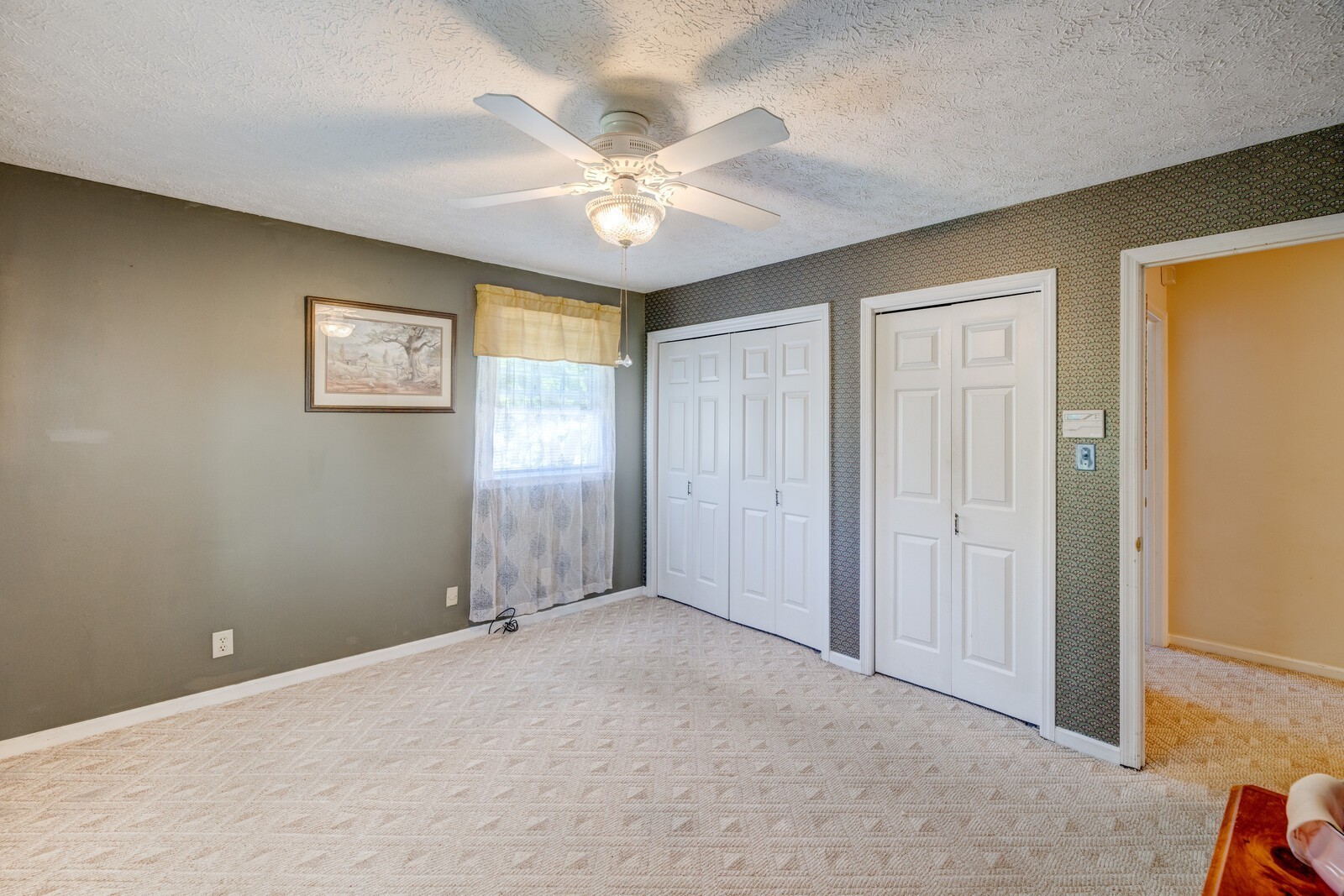 7486 Deer Ridge Road Primm Springs, TN 38476 - Photo 29 of 69 a view of an empty room with window and wooden floor