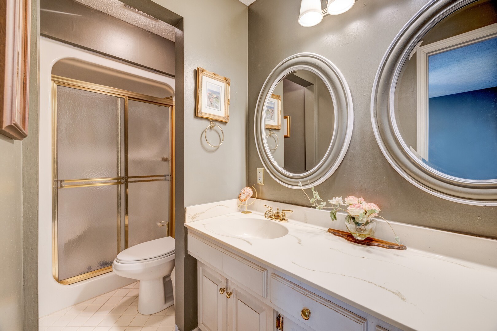 7486 Deer Ridge Road Primm Springs, TN 38476 - Photo 30 of 69 a bathroom with a toilet a sink and mirror