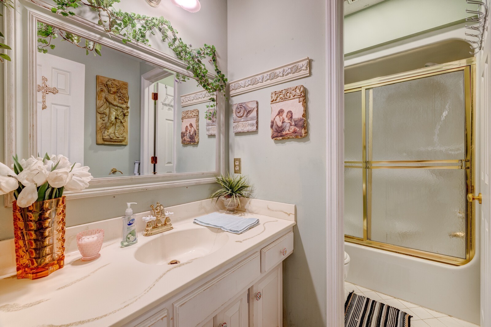 7486 Deer Ridge Road Primm Springs, TN 38476 - Photo 35 of 69 a bathroom with a sink and a mirror
