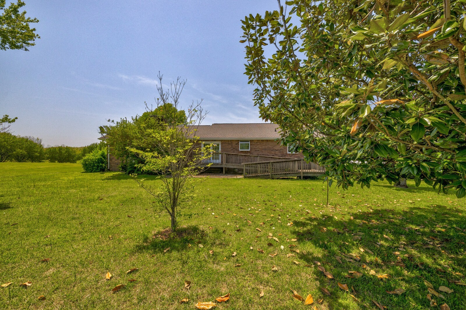 7486 Deer Ridge Road Primm Springs, TN 38476 - Photo 51 of 69 a swimming pool with yard in front of it
