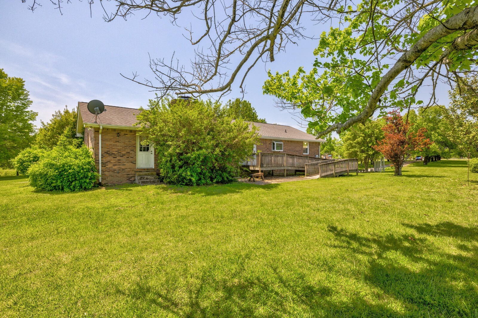 7486 Deer Ridge Road Primm Springs, TN 38476 - Photo 52 of 69 a front view of house with yard and green space