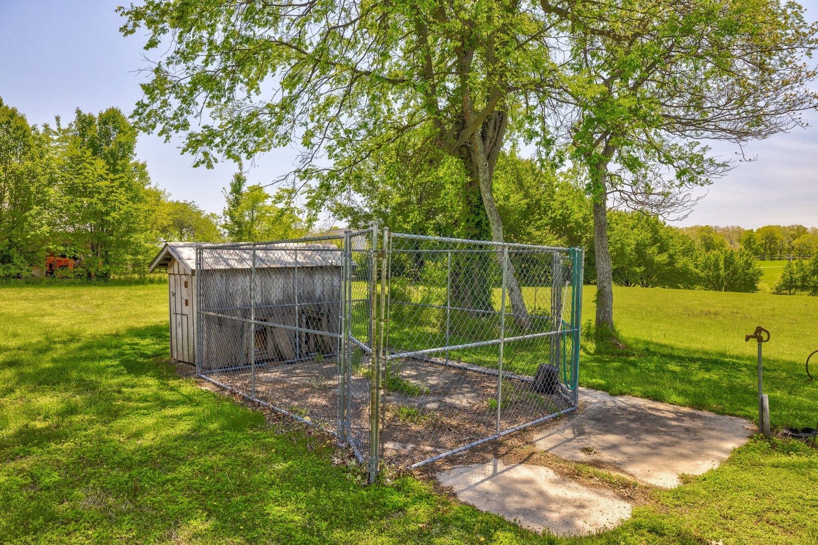 7486 Deer Ridge Road Primm Springs, TN 38476 - Photo 55 of 69 a view of a backyard with a wooden fence