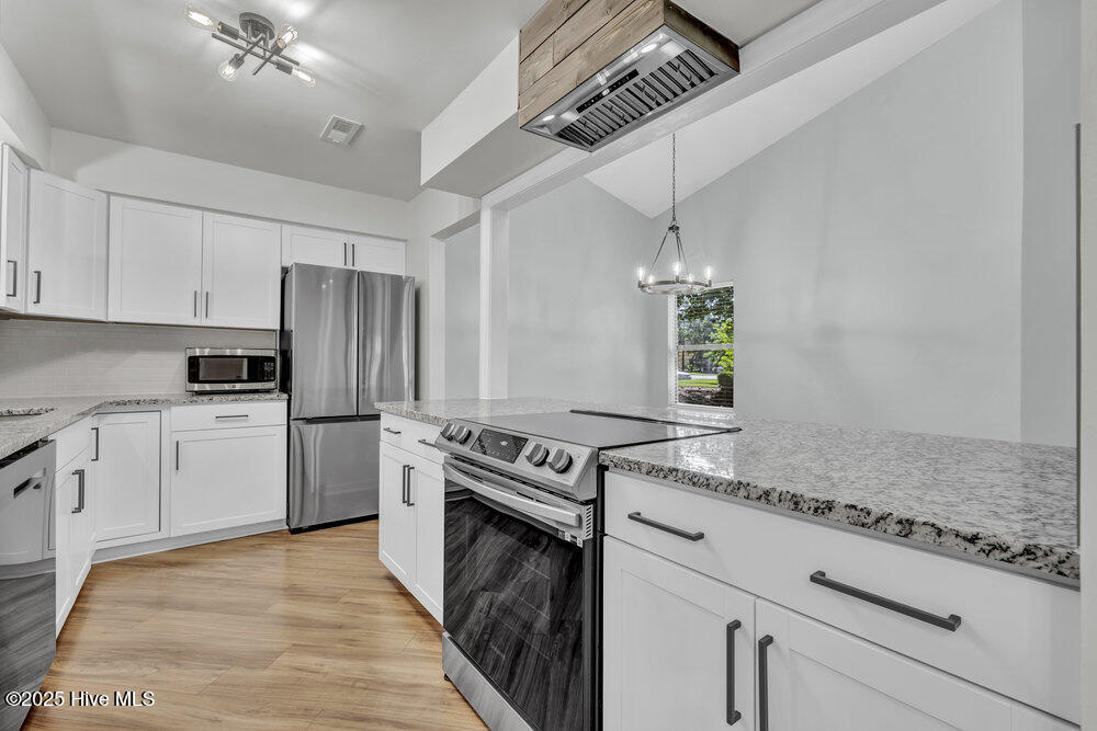 702 Azalea Drive, Unit 481 Hampstead, NC 28443 - Photo 5 of 40 005_6q7a5372