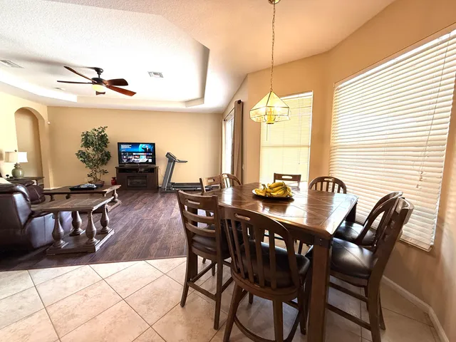 a bedroom with a bed with outer view and bedroom view