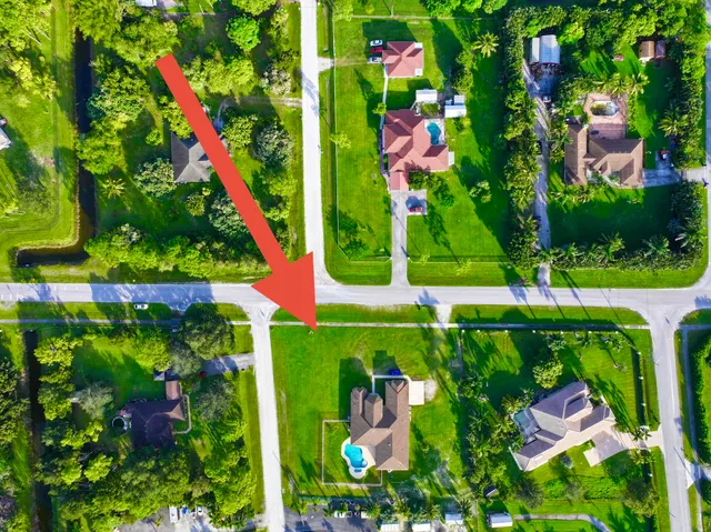 a living room with lots of furniture and a chandelier