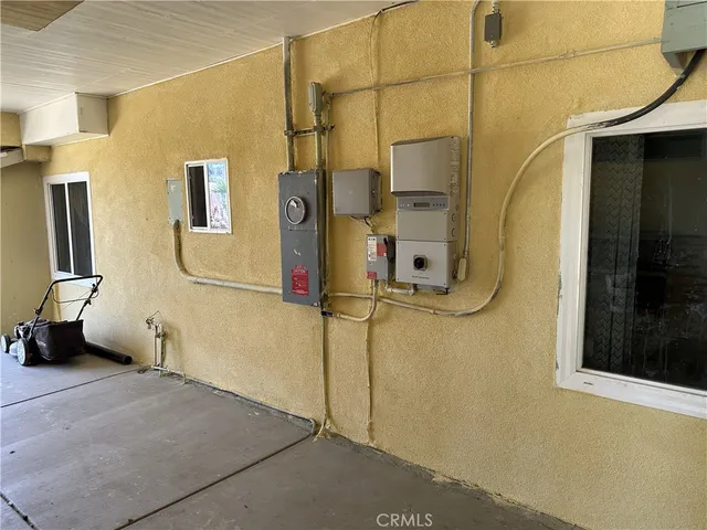 a bathroom with a tub a mirror and a shower