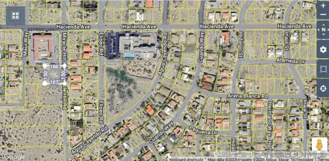 a view of an outdoor space and a mountain view in back