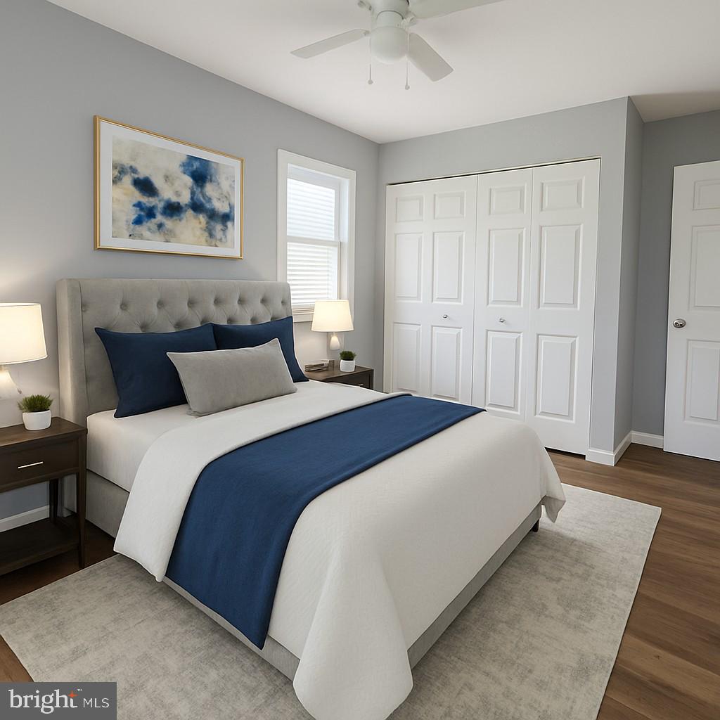 209 Warfield Road Newark, DE 19713 - Photo 12 of 18 a bedroom with bed and paintings on the wall