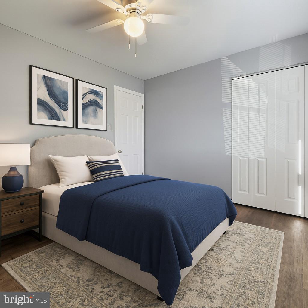 209 Warfield Road Newark, DE 19713 - Photo 13 of 18 a bed room with a bed and a chandelier