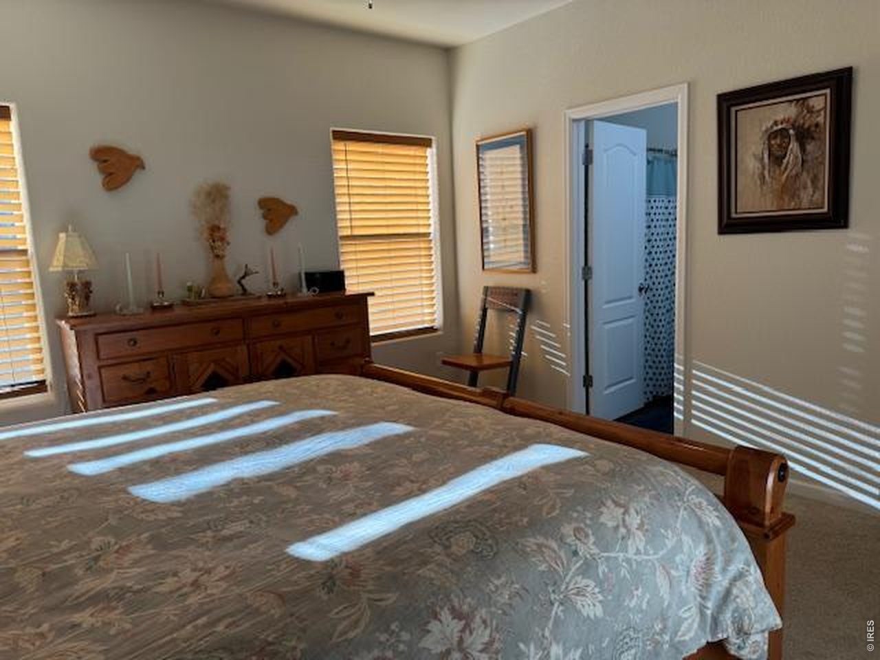 2865 Big Thunder Road Berthoud, CO 80513 - Photo 26 of 35 a bedroom with a bed and a window
