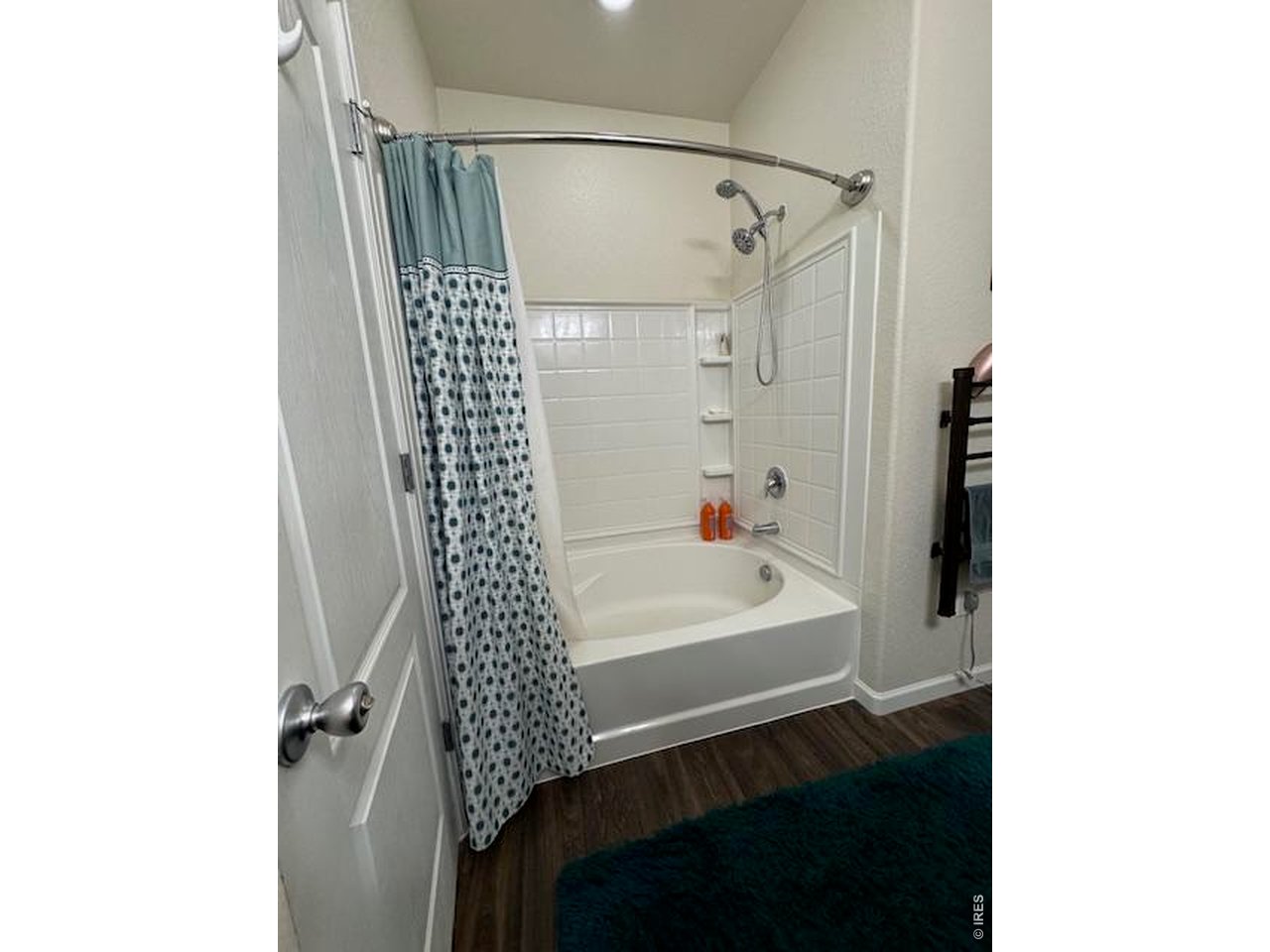2865 Big Thunder Road Berthoud, CO 80513 - Photo 29 of 35 a bathroom with a bathtub and shower