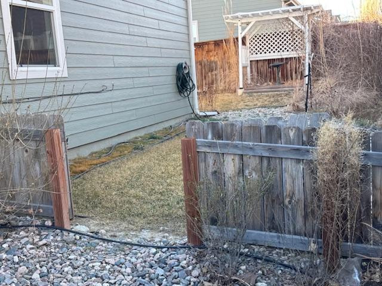 2865 Big Thunder Road Berthoud, CO 80513 - Photo 32 of 35 a front view of a house with a yard