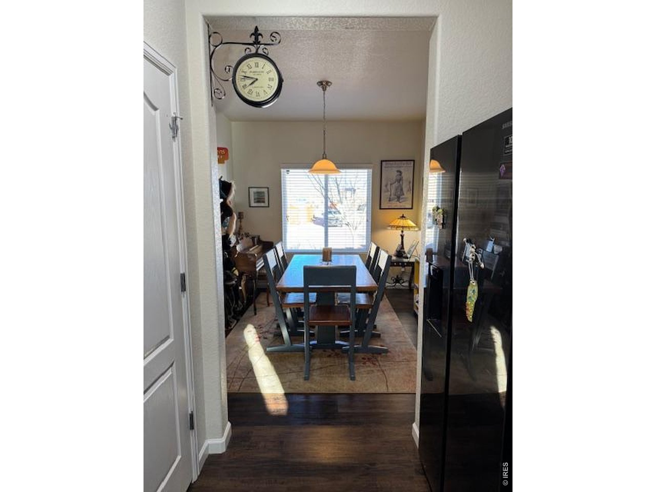 2865 Big Thunder Road Berthoud, CO 80513 - Photo 7 of 35 a view of living room with furniture and wooden floor