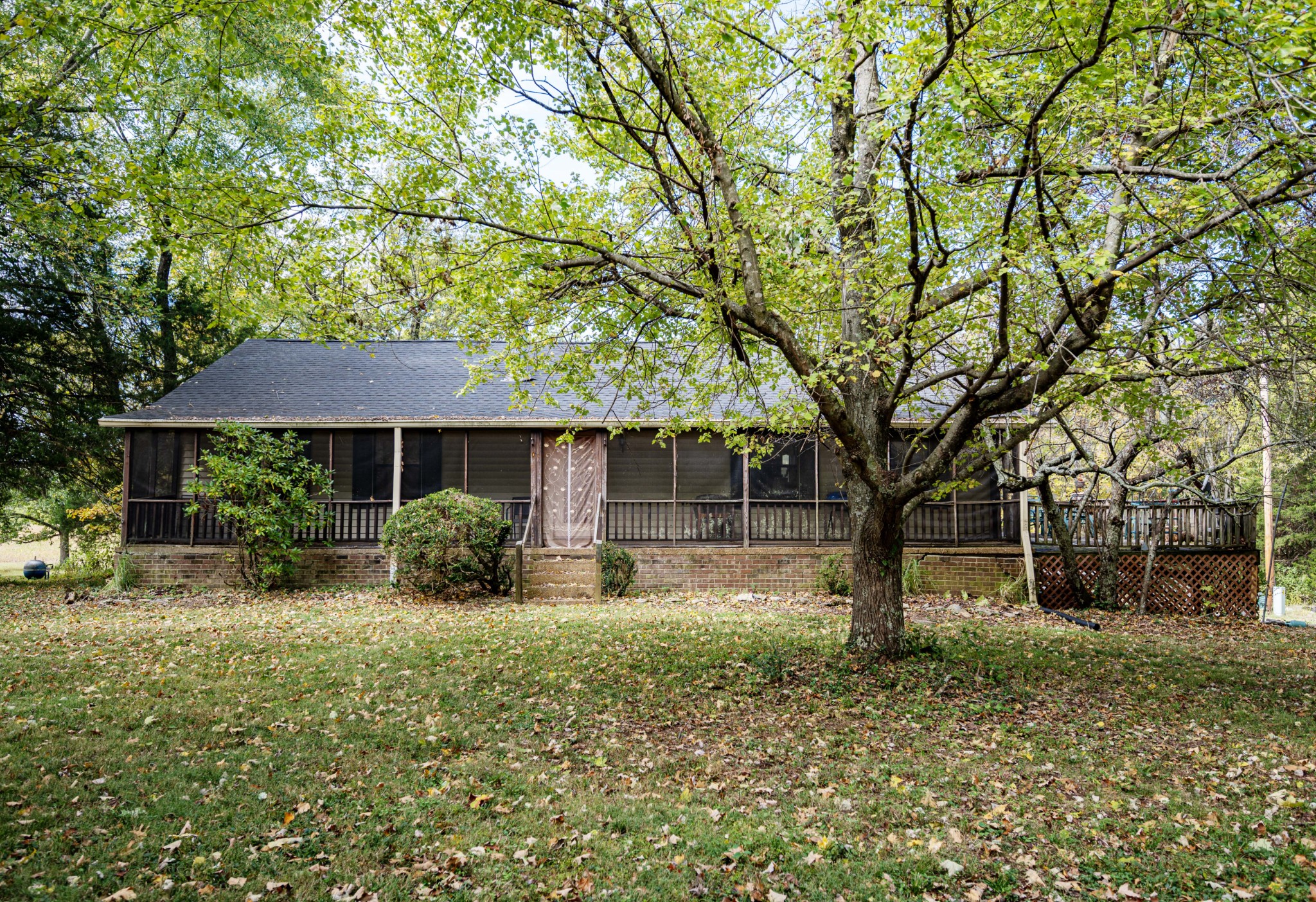 145 Crenshaw Road Bethpage, TN 37022 - Photo 2 of 44 a front view of a house with yard and trees