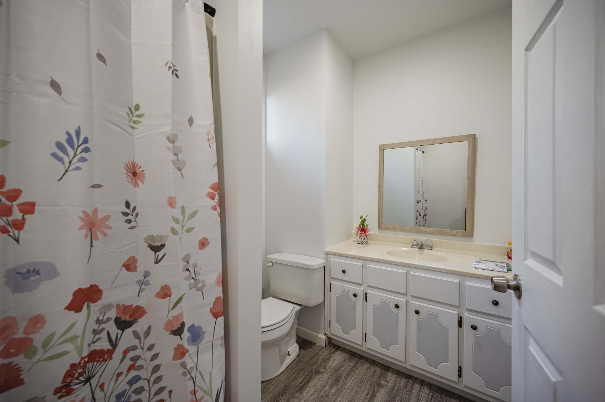 145 Crenshaw Road Bethpage, TN 37022 - Photo 25 of 44 a bathroom with a double vanity sink toilet and shower