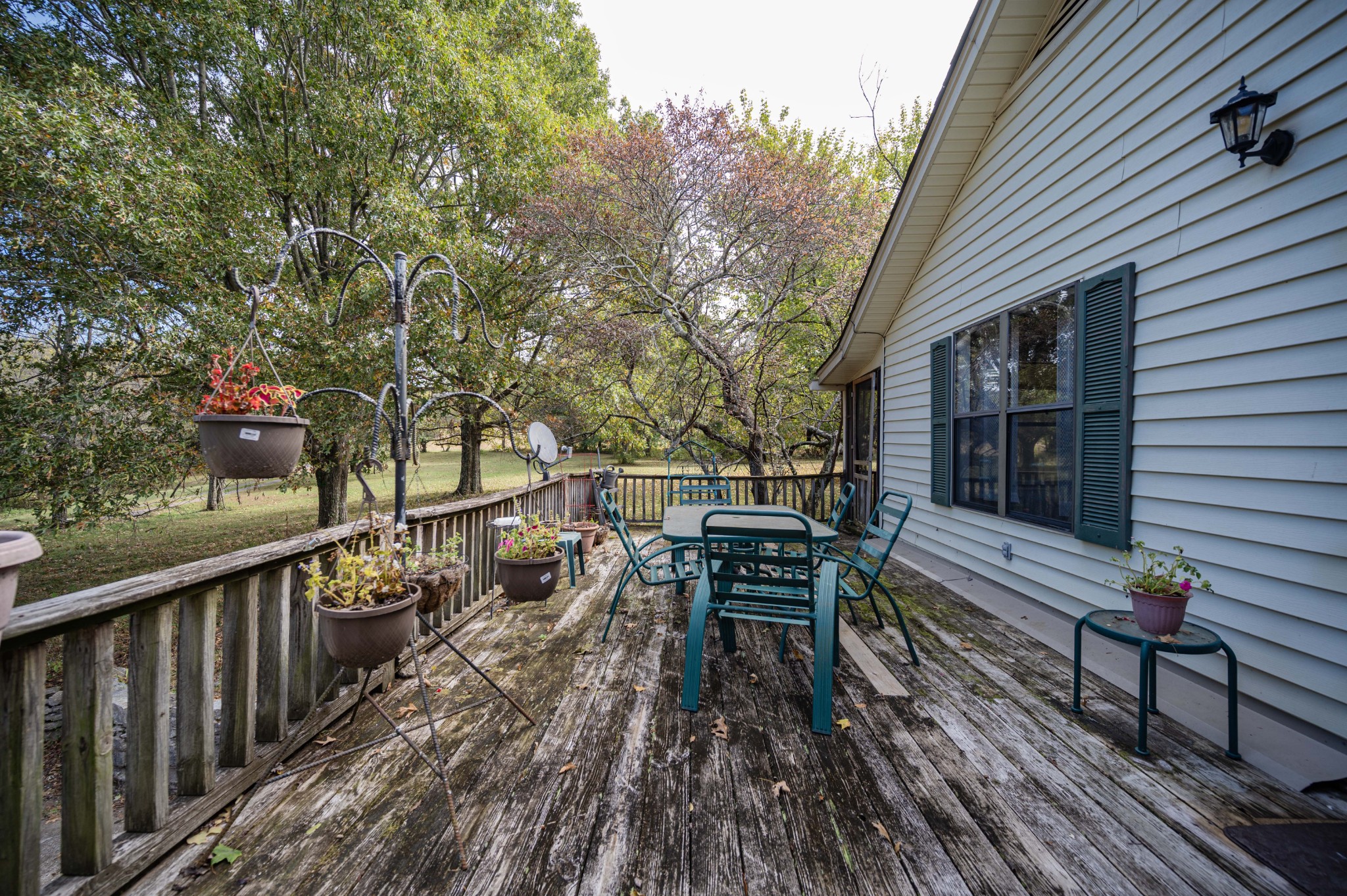 145 Crenshaw Road Bethpage, TN 37022 - Photo 44 of 44 a view of a wooden chairs and table in the balcony