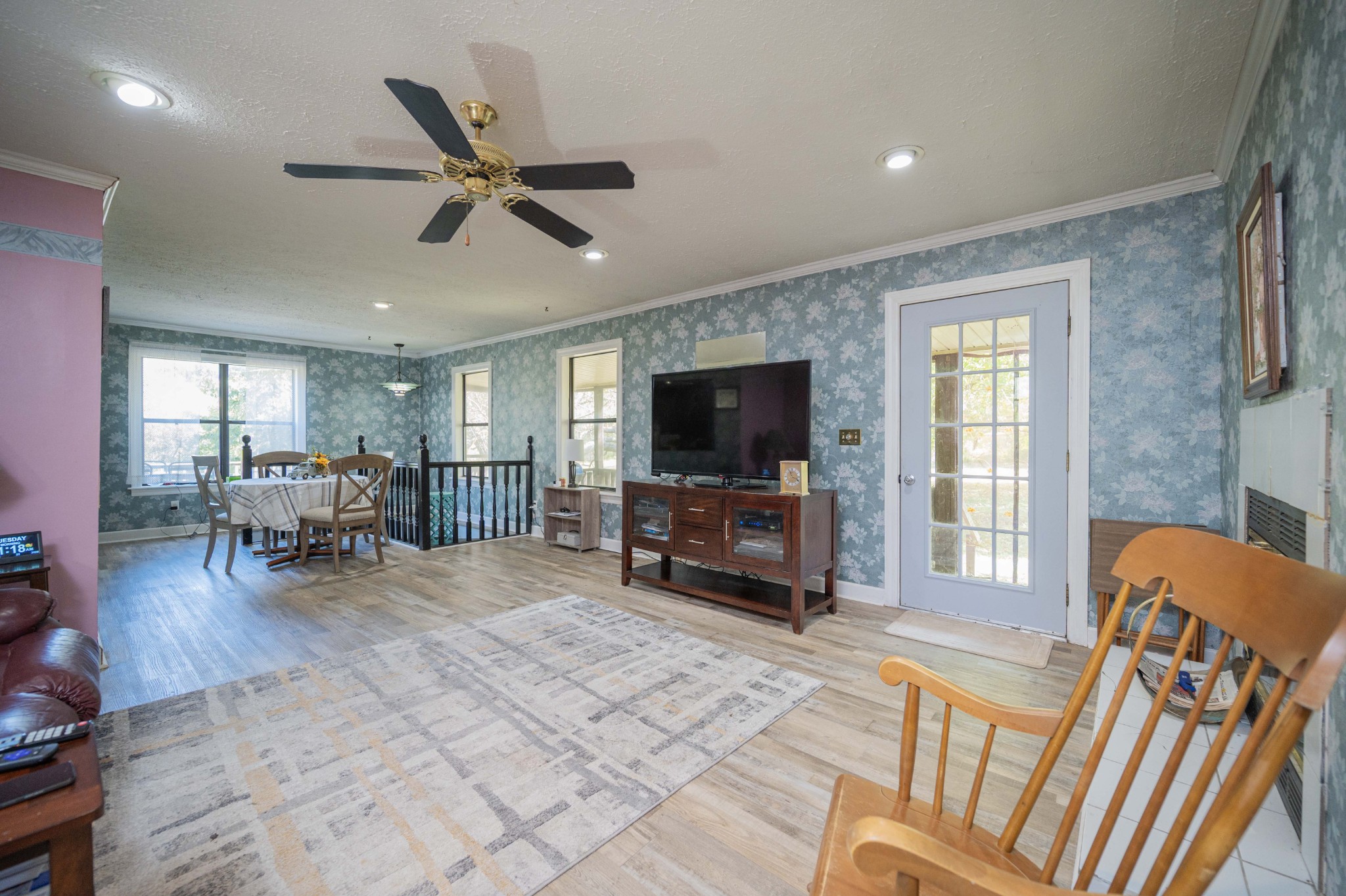 145 Crenshaw Road Bethpage, TN 37022 - Photo 10 of 44 a living room with furniture and a flat screen tv with wooden floor