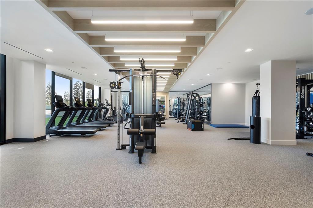 2425 Peachtree Street Northeast, Unit 707 Atlanta, GA 30305 - Photo 27 of 39 a view of a room with gym equipment