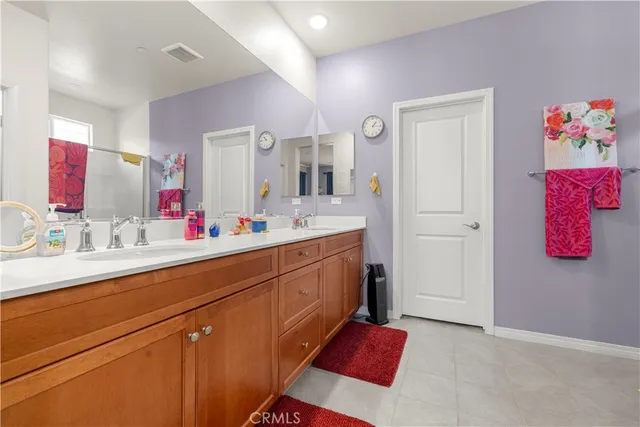 a bathroom with a toilet sink and vanity