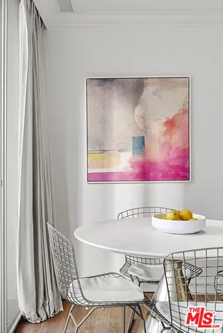 a view of balcony with a couple of chairs