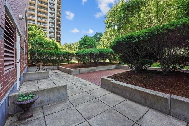 a view of a bench in a yard