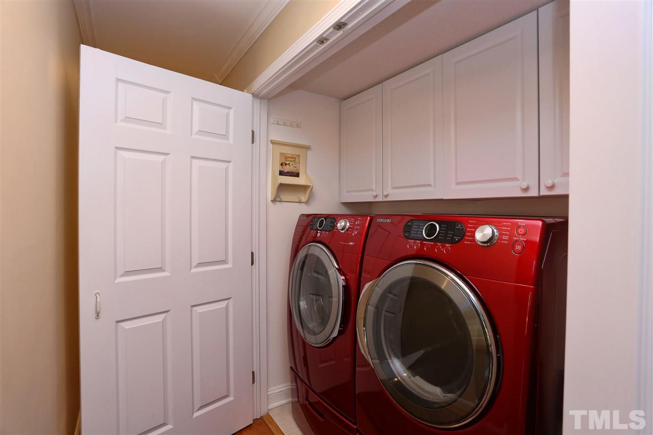 1809 Albacore Lane Raleigh, NC 27612 - Photo 16 of 25 a utility room with dryer and washer
