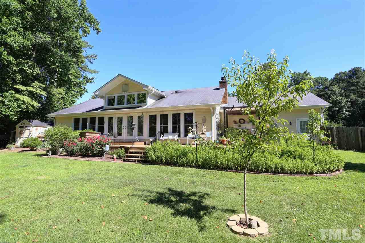 1809 Albacore Lane Raleigh, NC 27612 - Photo 19 of 25 a front view of a house with a yard