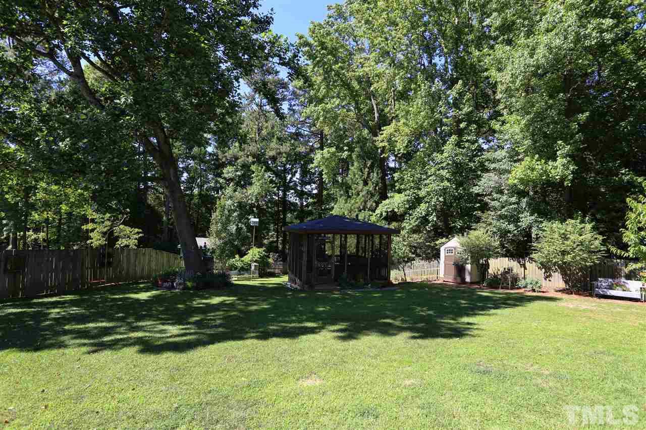 1809 Albacore Lane Raleigh, NC 27612 - Photo 20 of 25 a front view of a house with garden