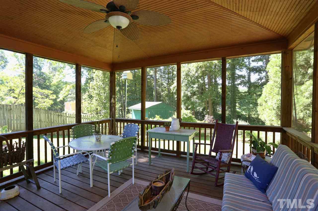 1809 Albacore Lane Raleigh, NC 27612 - Photo 23 of 25 a view of a porch with furniture and wooden floor
