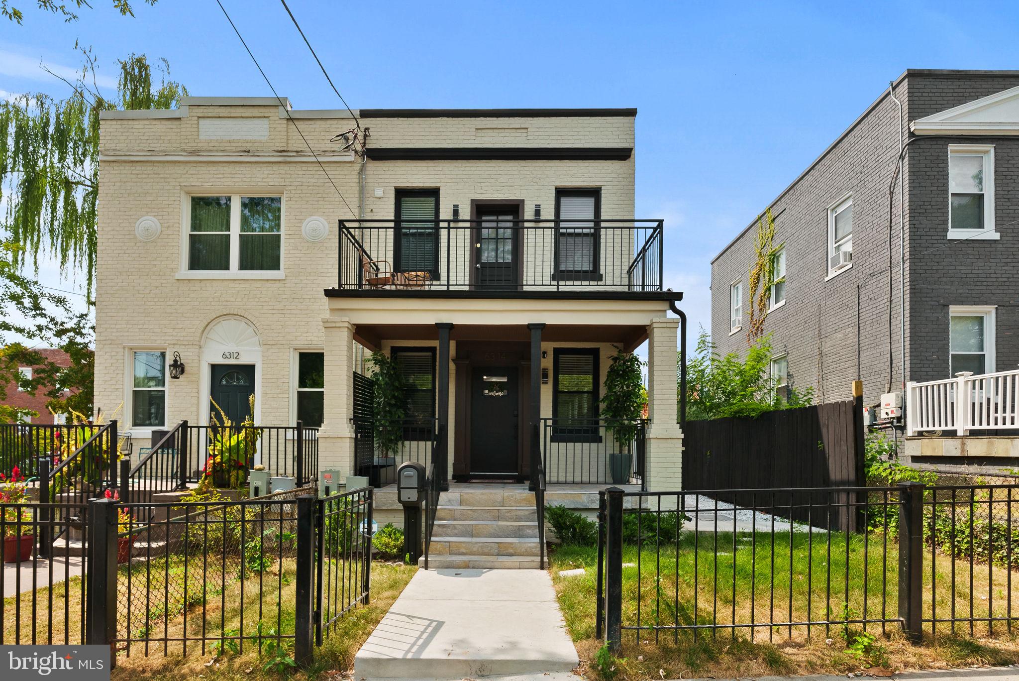 6314 7th Street Northwest Washington, DC 20011 - Photo 1 of 19 a view of a house with backyard porch and wooden floor