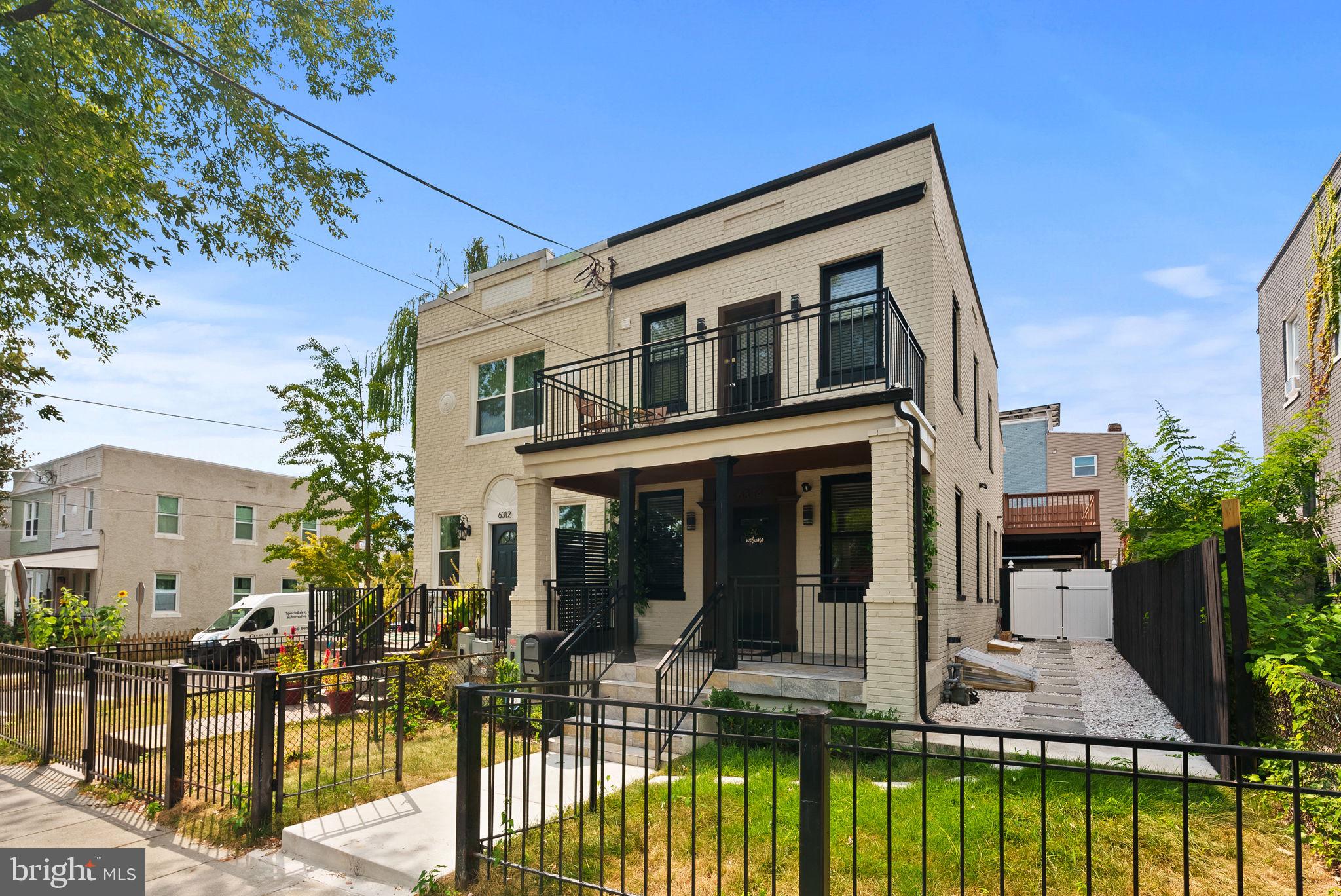 6314 7th Street Northwest Washington, DC 20011 - Photo 3 of 19 a front view of a house with swimming pool