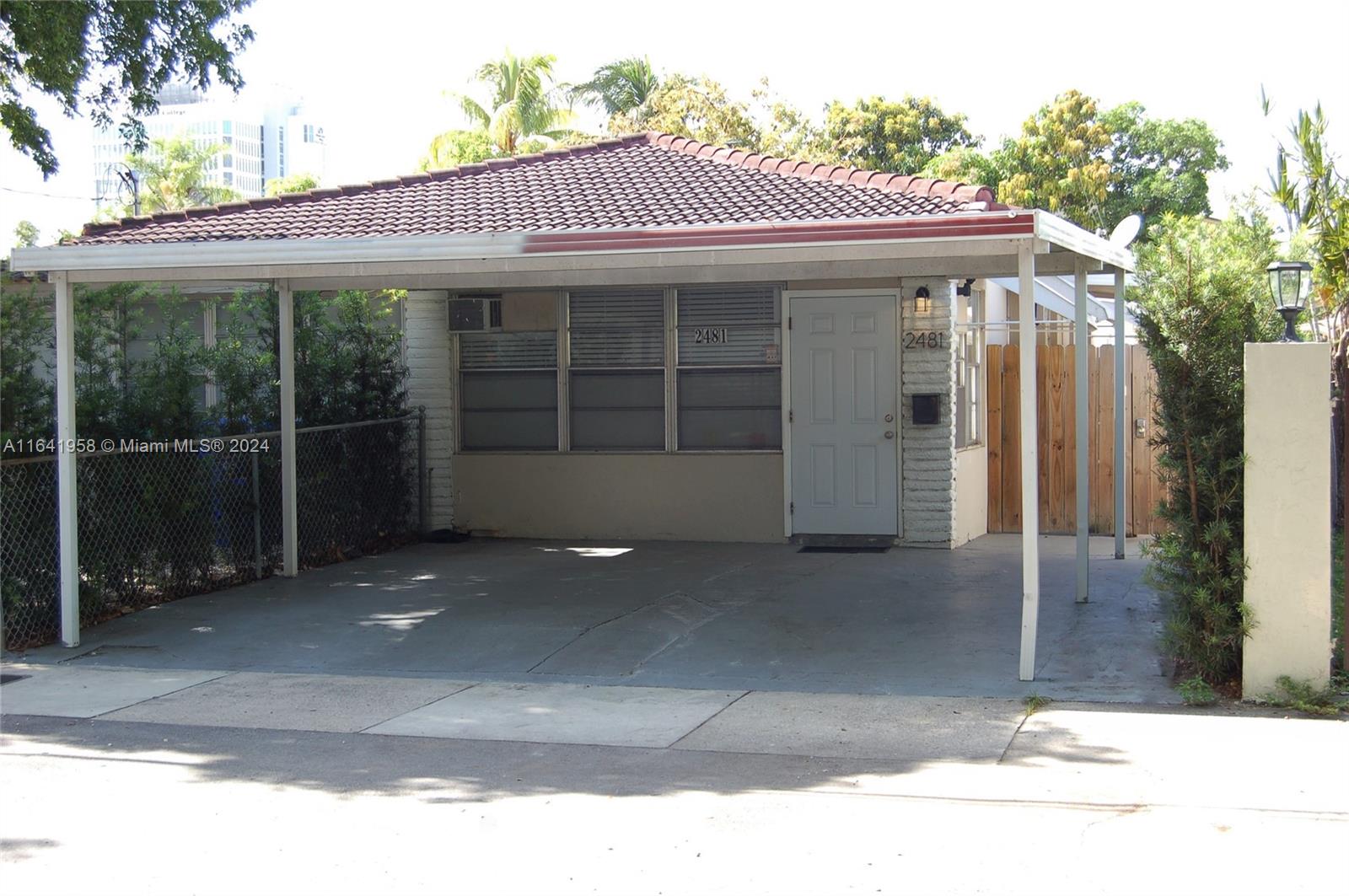 2481 Southwest 11th Street, Unit 2481 Miami, FL 33135 - Photo 1 of 9 a view of a house with a outdoor space