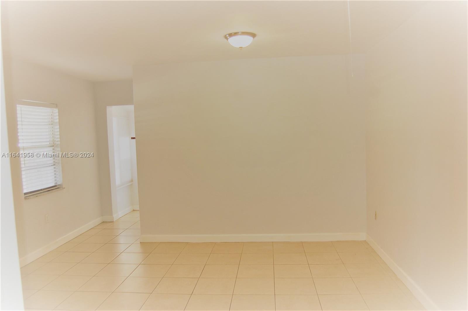 2481 Southwest 11th Street, Unit 2481 Miami, FL 33135 - Photo 3 of 9 a view of an empty room