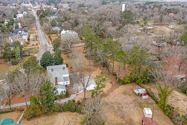 an aerial view of residential house with outdoor space