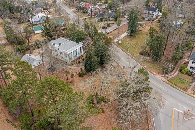 an aerial view of residential house with outdoor space