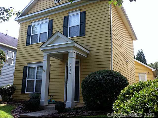 8236 Townley Road Huntersville, NC 28078 - Photo 2 of 10 a front view of a house with plants