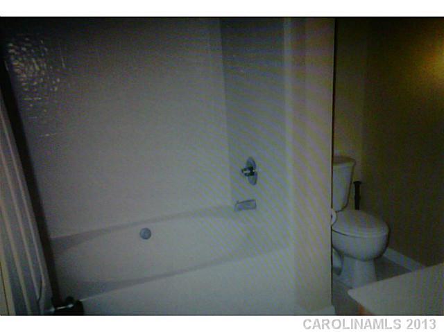 8236 Townley Road Huntersville, NC 28078 - Photo 10 of 10 a bathroom with a sink and a toilet